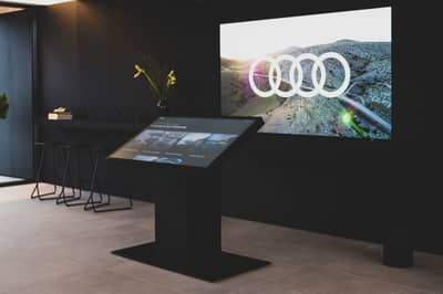 Audi's Innovative Quick Charging Hub: Chill In A Swanky Lounge Or Test Drive an E-Tron
